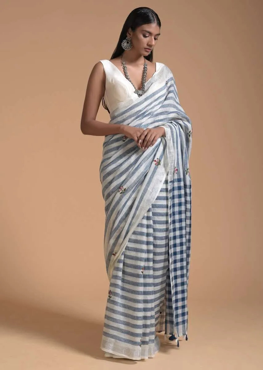 Blue And White Saree In Linen With Woven Stripes And Chain Stitch Embroidered Floral Buttis Online - Kalki Fashion